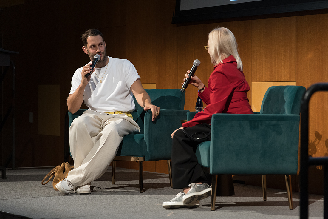 Simon Porte Jacquemus seated on stage with Valerie Steele