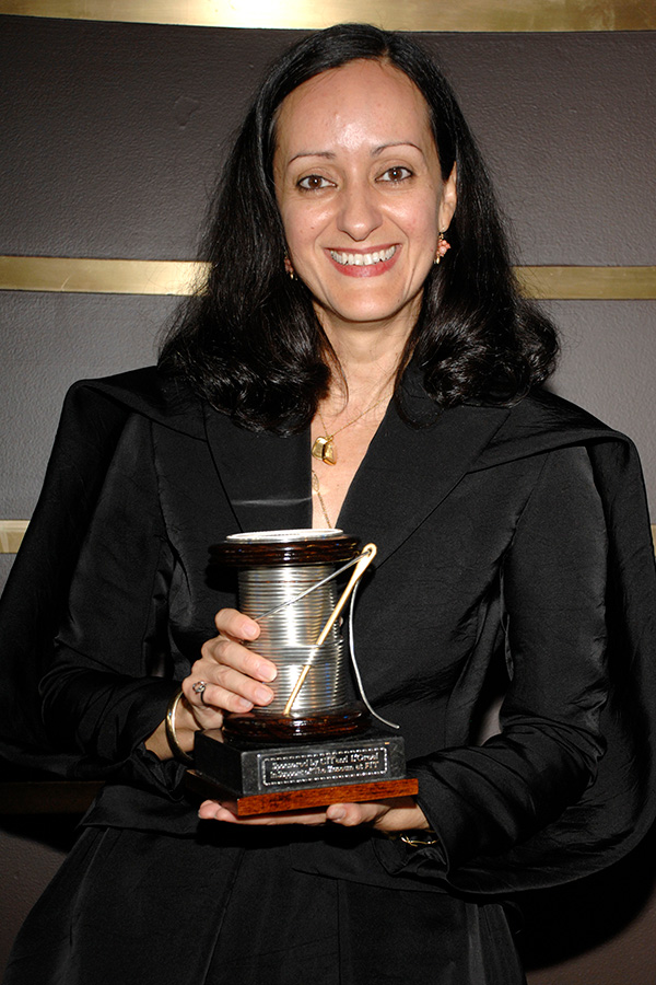 Isabel Toledo smiling and holding Couture Council Award