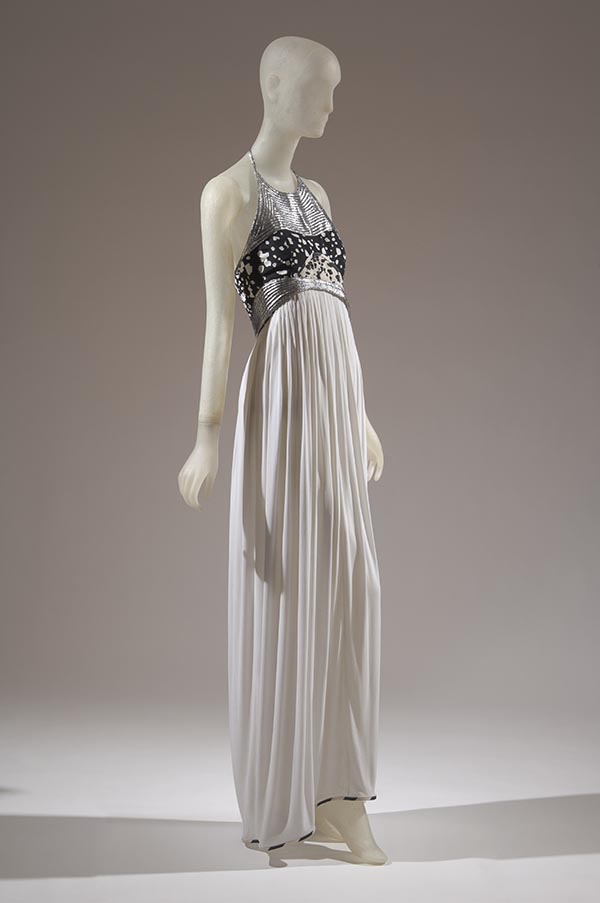 rayon and silk halter top gown with a metallic trim