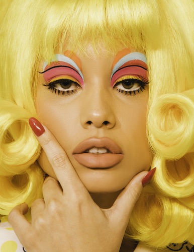 women in blonde wig and colorful eyeshadow