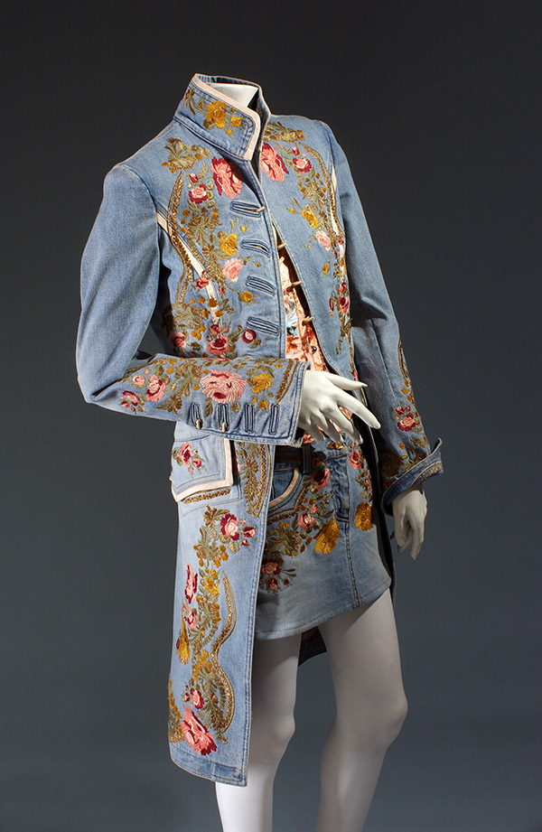 light blue denim redingote and micro mini skirt embroidered with large floral border design
