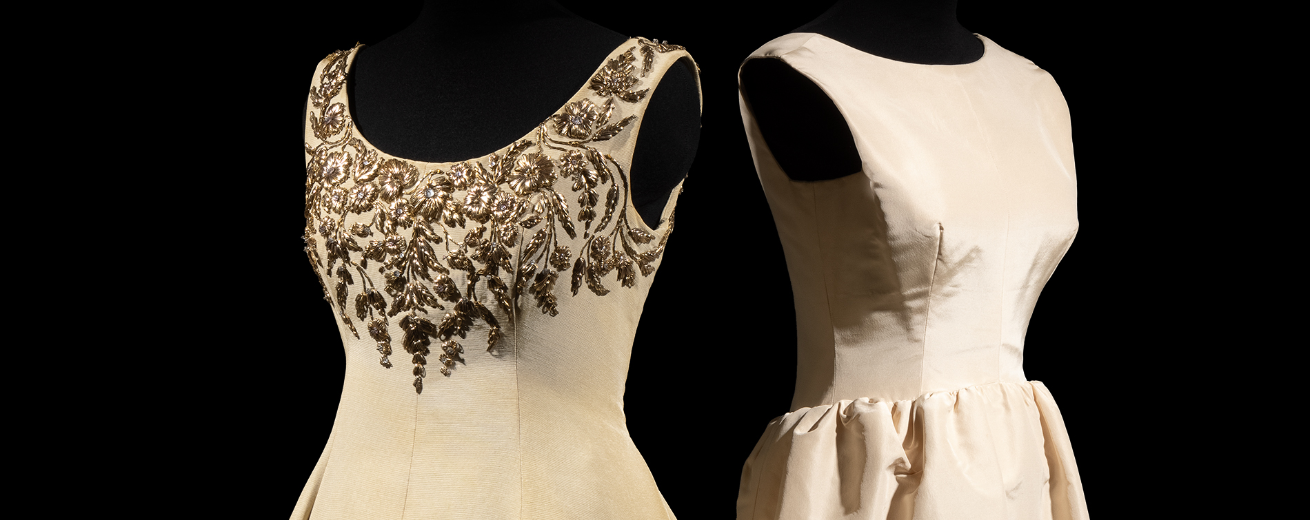 bodice view of two cream-colored dresses side-by-side