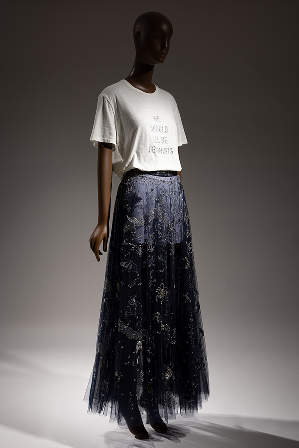 white t-shirt paired with blue tulle full-length skirt