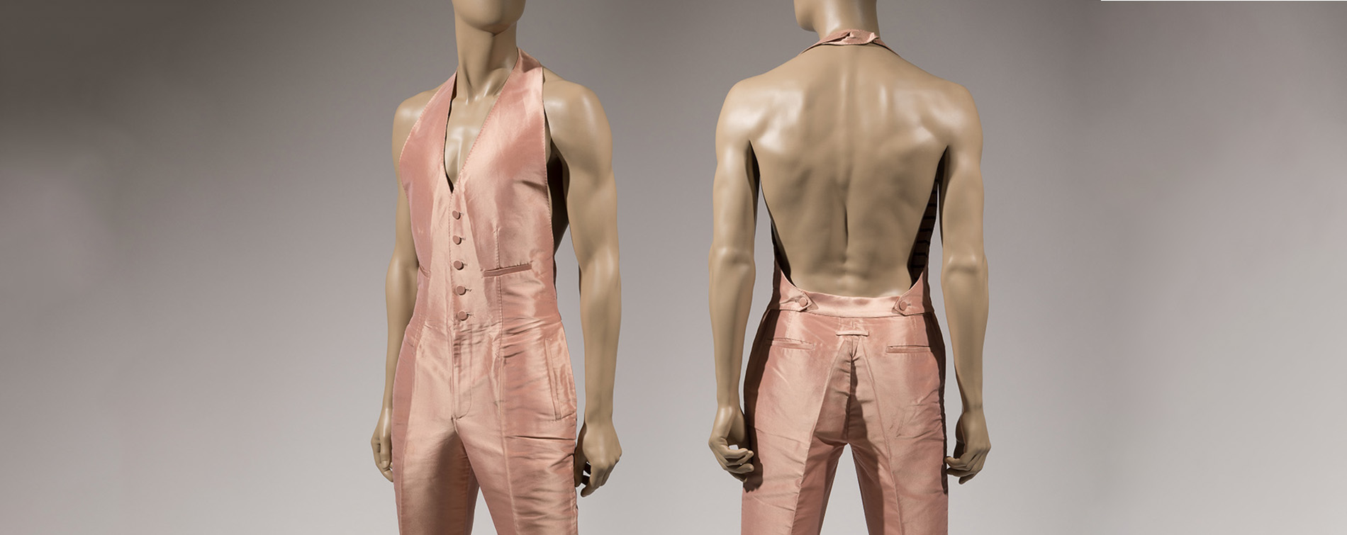 two mannequins wearing pink halter top suit