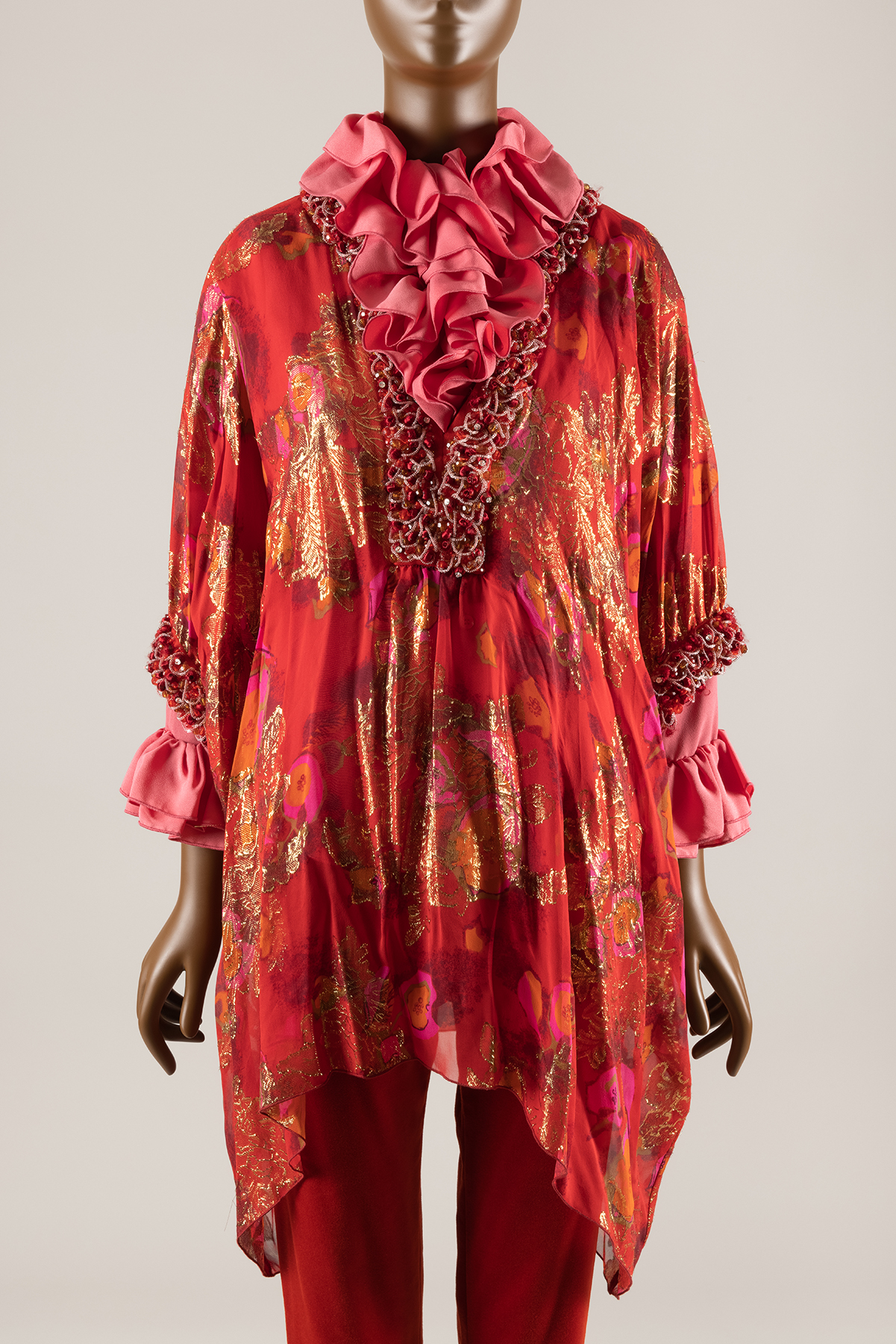 red ensemble with gold accents