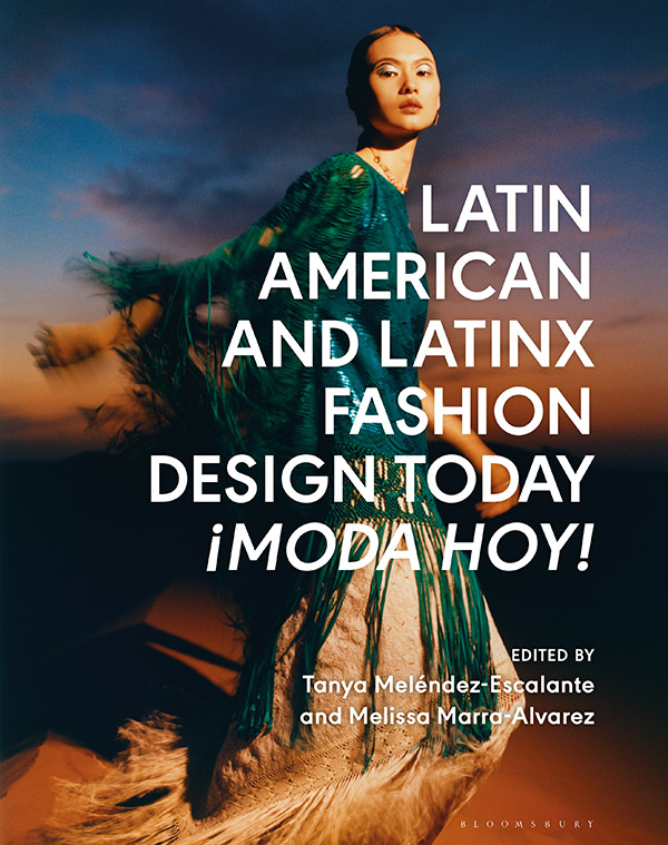 book cover of "Moda Hoy" featuring a woman in a green dress against a blue-orange sky with clouds