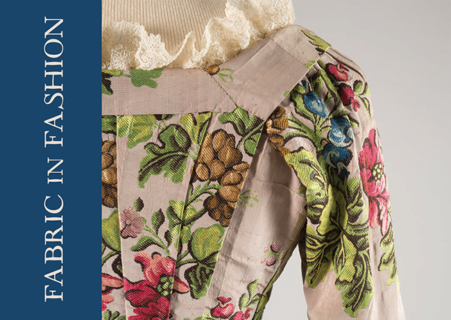 cropped view of the back of a robe a francaise with floral brocade fabric