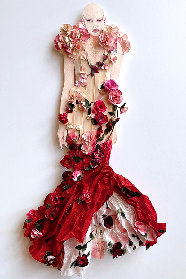 paper fashion doll in a cream sleeveless ballgown with red skirt and rolled paper flower accents