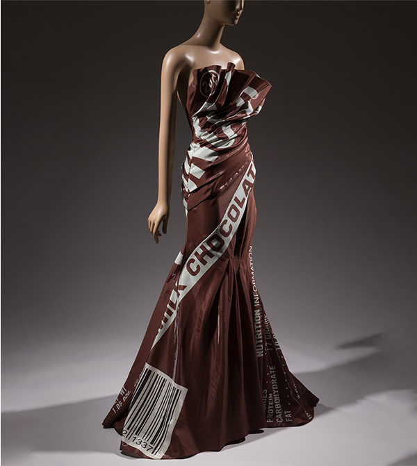 Shimmering brown and grey strapless evening gown with Chocolate Bar print with ruffled neckline and full trumpet skirt