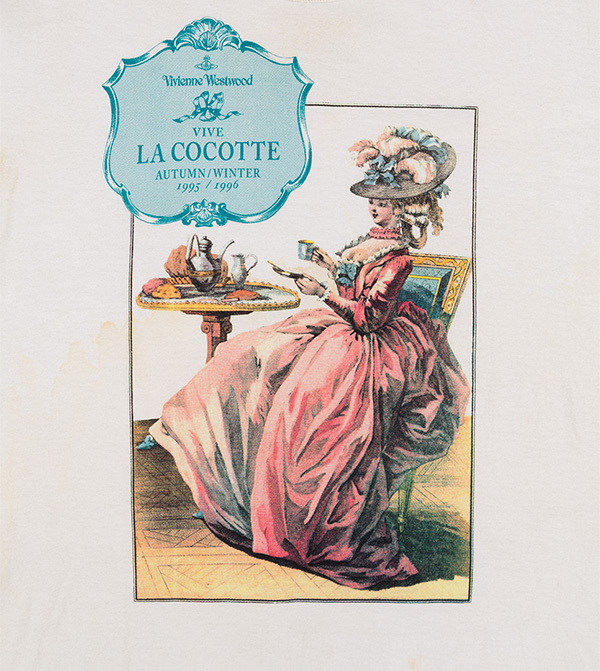 White t-shirt with printed design of 18th century woman drinking tea with text “Vivienne Westwood vive La Cocotte Autumn Winter 1995/1996”