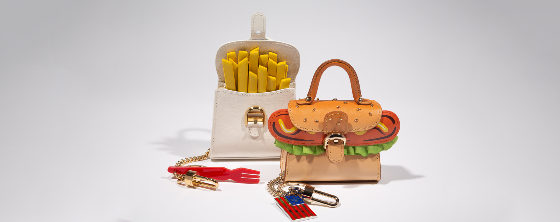 french fries purse and hot dog purse with fork and and american flag keychains