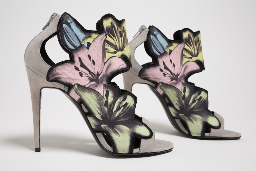 high heels with flower details in pink, green, and blue