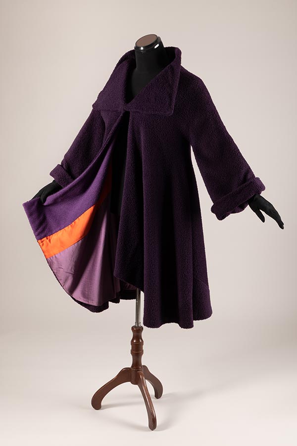 purple wool coat with large lapels and color-blocked lining