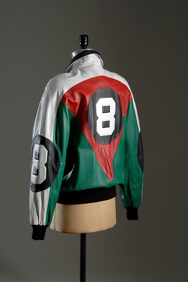 bomber jacket in white, green and red with eight-ball design on back and sleeve