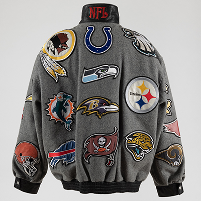 back view of gray nfl jacket with football team patches