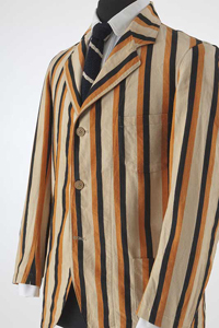 cream, orange, and black striped man's blazer