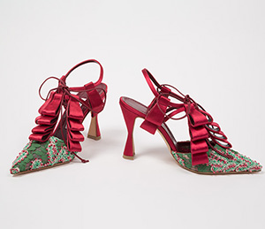 red and green heels with ribbons