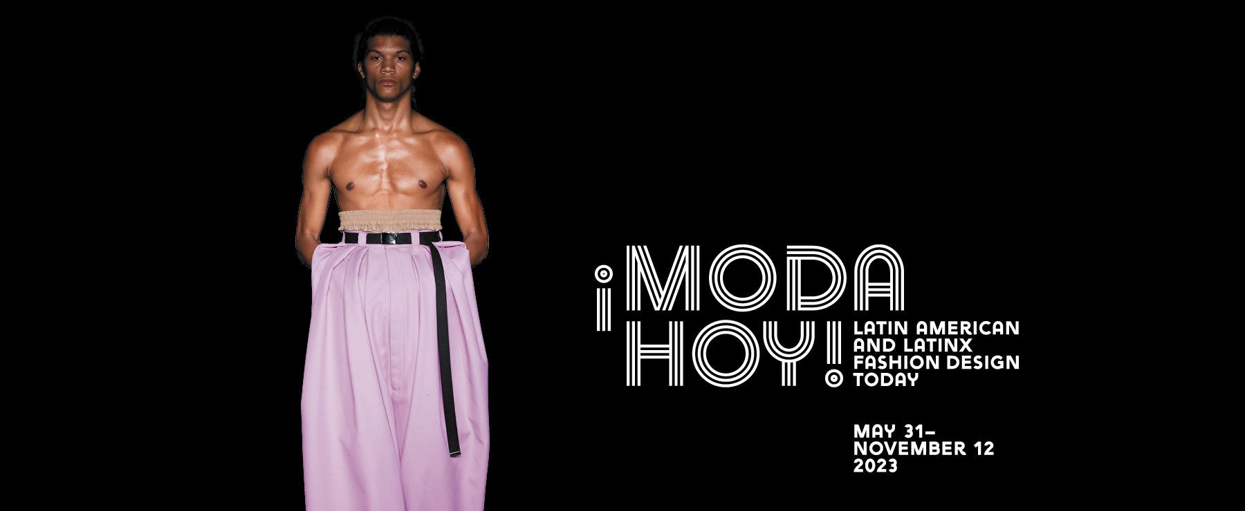 model wearing pink high waisted wide leg pants
