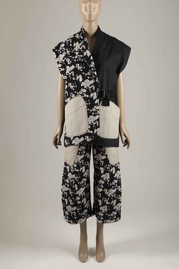 black and white ensemble made out of used car parts