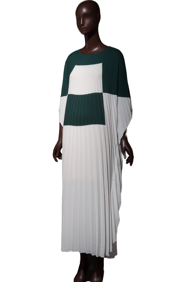mannequin in a green and white checkered floor-length pleated dress