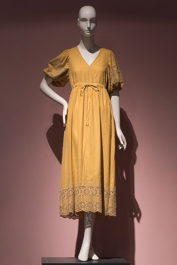Yellow hand woven cotton dress with v neck bodice, short puffy sleeves, draw string waistband, allover floral eyelet 
