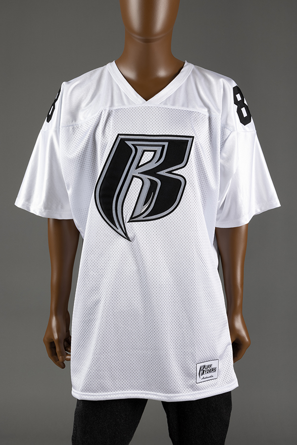 white polyester V neck short sleeve football jersey with 'R' logo center front