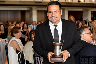 Narciso Rodriguez holding award