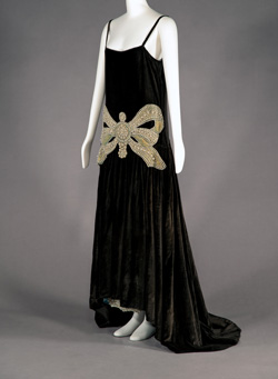 floor length dress with beaded design at waist