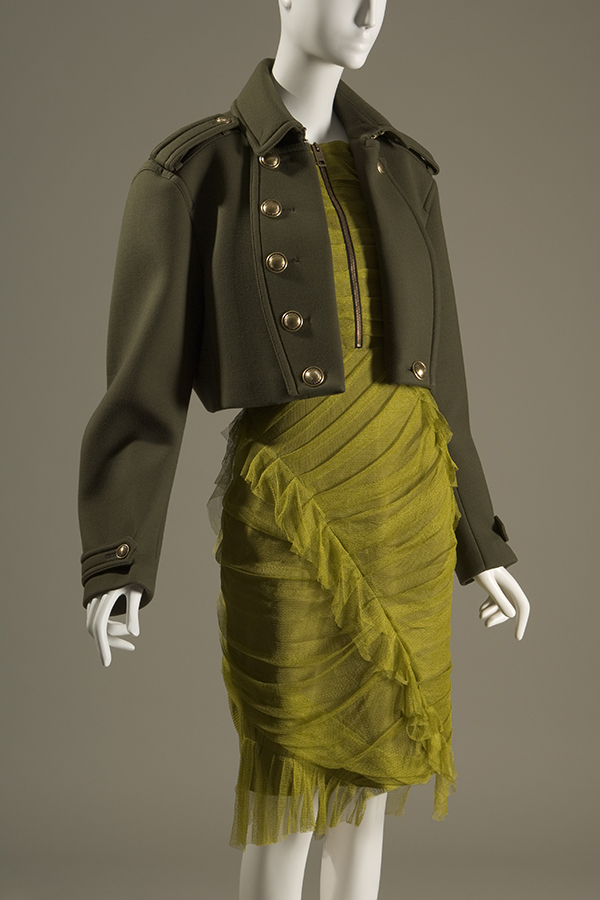 draped and pleated short sleeve dress with army green military style cropped jacket with epaulets and folded over front lapels