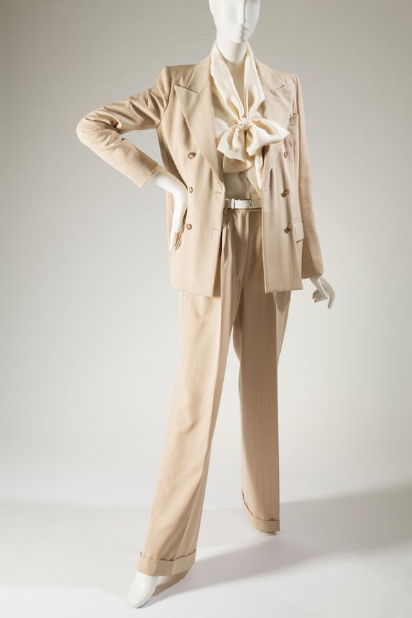 beige pantsuit with light and dark gray pinstripe