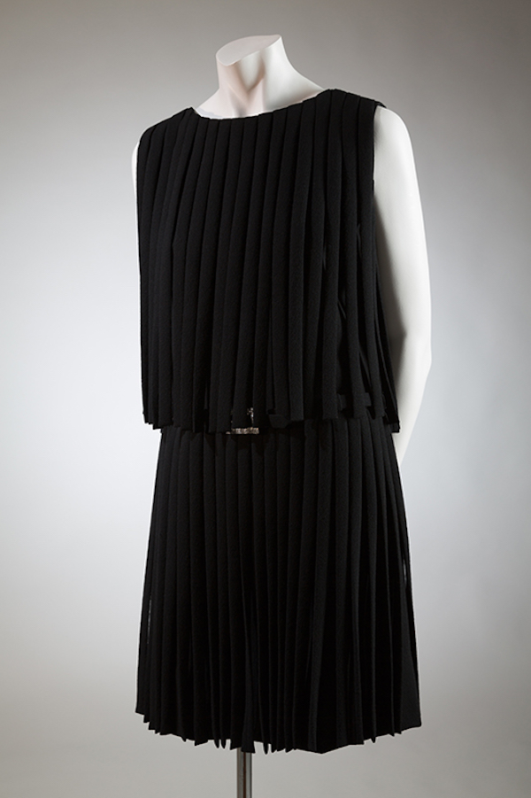 sleeveless black mini dress made up of wool pleats
