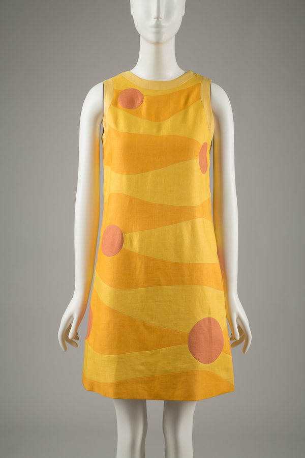 sleeveless mini dress with orange and yellow wave pattern