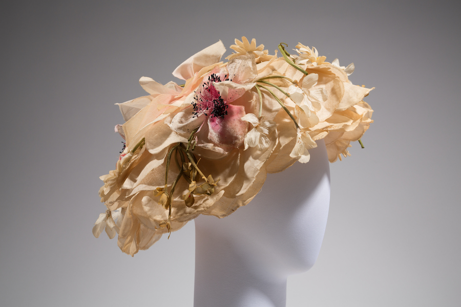 brimmed hat made entirely of artificial flowers and flower petals