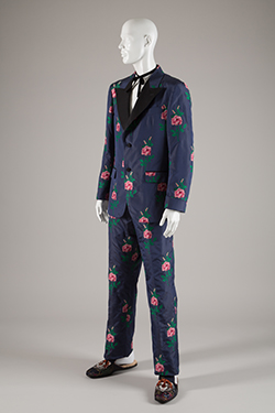 mannequin in two-piece man's suit embroidered with roses