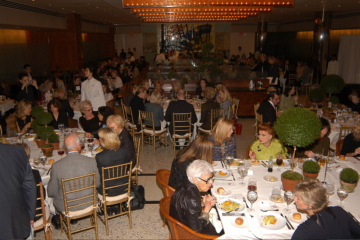 people dining at various circle tables