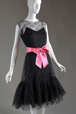 Cristóbal Balenciaga, cocktail dress, black lace, black silk, fuchsia silk. Circa 1958, France, gift of The Costume Institute of The Metropolitan Museum of Art, from the Estate of Ann E. Woodward