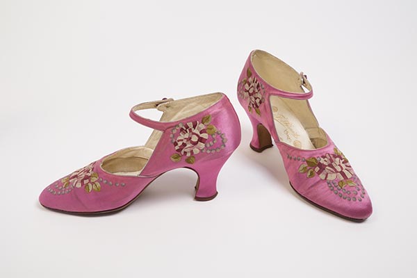 Pair of pink silk satin tambour embroidered ankle strap pumps with Louis heel and pink, white, green and light blue embroidered flower motif at vamp and right and left counter.
