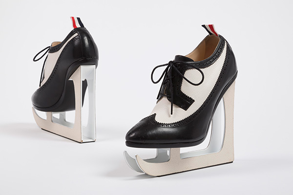 black and white leather platforms that resemble ice skates