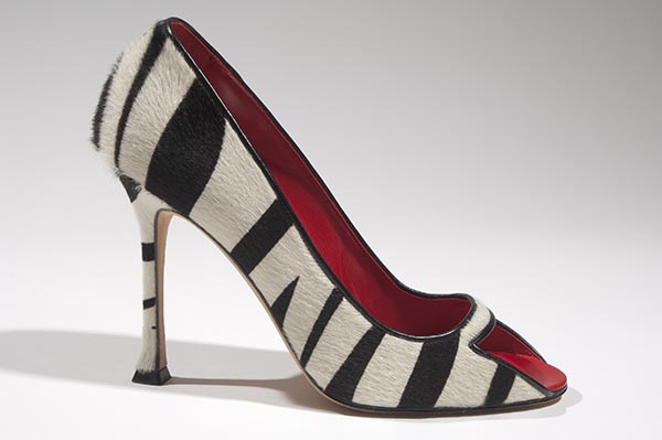 Open-toe stiletto pumps in black and white zebra stripe pony skin; squared toe cut and heel tip