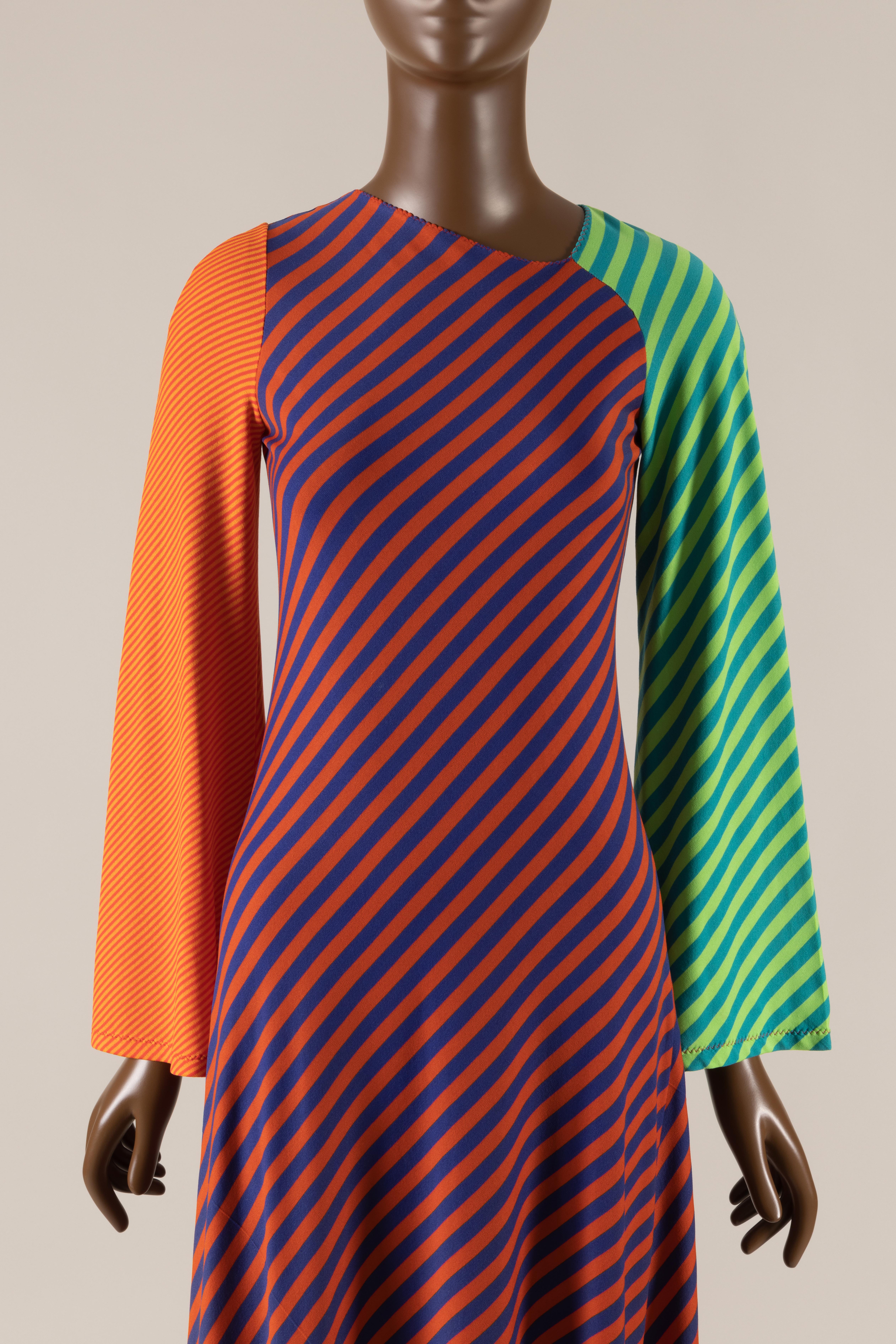 multicolored striped dress with asymmetrical neckline