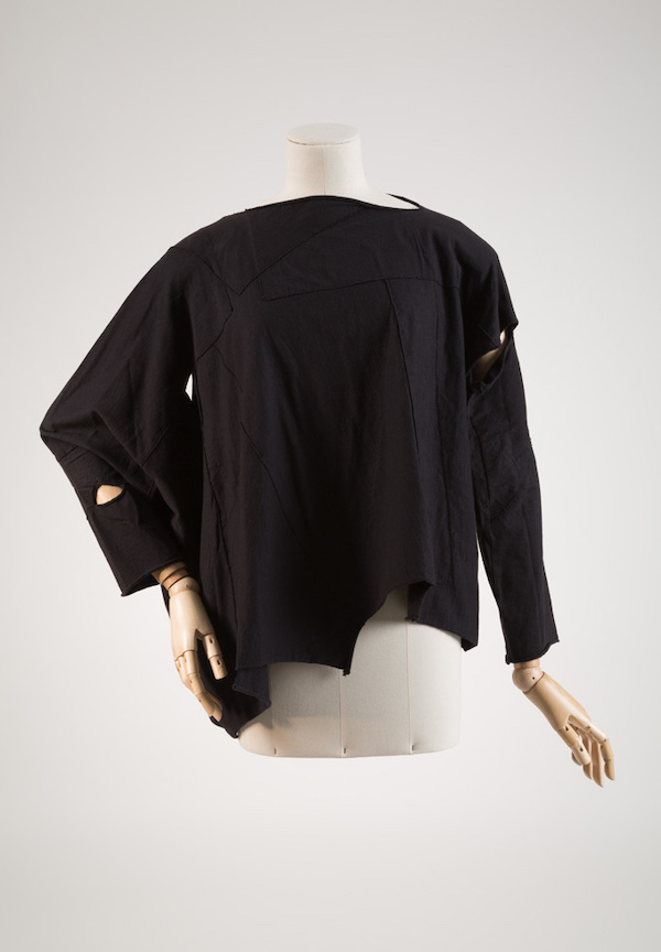 long sleeve black shirt with cut outs along arms