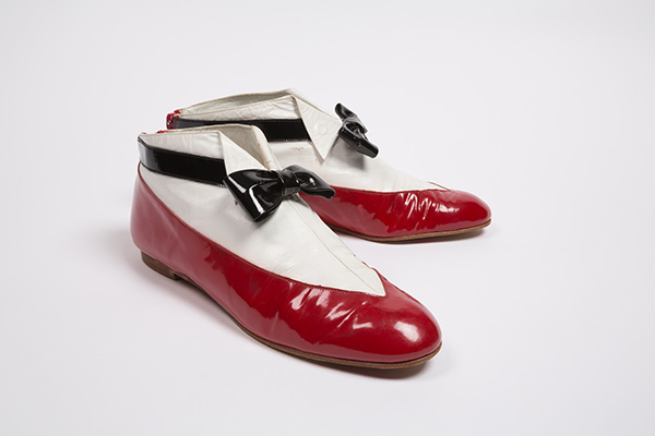 ankle boots with a tuxedo illusion red leather with pointed inset of white leather styled as a man's white collar with black patent leather bowtie